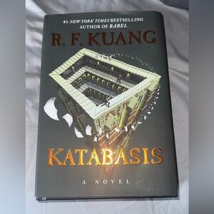 Katabasis Novel with Gold and Gray Cover